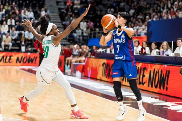 LYON-VILLEURBANNE, FRANCE - MARCH 14: Janine Pontejos (Philippines, 7) shoots the ball over Promise Amukamara (Nigeria, 10) during the FIBA Women™s World Cup Qualifying Tournament match between Nigeria (NGR) vs. Philippines (PHI) at Astroballe on matchday 3 of the FIBA Women™s World Cup Qualifying Tournament on March 14, 2026 in Lyon-Villeurbanne, France. France Copyright: xSteffiexWunderlx