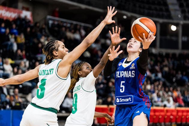 LYON-VILLEURBANNE, FRANCE - MARCH 14: Kent Jane Pastrana (Philippines, 5) shoots the ball over Pallas Kunaiyi-Akpanah (Nigeria, 3) and Ifunanya Okoro (Nigeria, 9) during the FIBA Women™s World Cup Qualifying Tournament match between Nigeria (NGR) vs. Philippines (PHI) at Astroballe on matchday 3 of the FIBA Women™s World Cup Qualifying Tournament on March 14, 2026 in Lyon-Villeurbanne, France. France Copyright: xSteffiexWunderlx