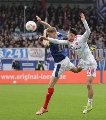 Alexander Bernhardsson Holstein Kiel , Berkay Yilmaz 1 FC Nuernberg Football, Men, Season 2025 2026, 2 BL, Holstein Stadion, Holstein Kiel vs 1 FC Nuernberg, 2 3 DFL REGULATIONS PROHIBIT ANY USE OF PHOTOGRAPHS AS IMAGE SEQUENCES AND OR QUASI VIDEO