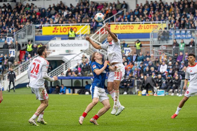 14 03 2026 Soccer 2 Bundesliga Men Season 2025 2026 26 Matchday KSV Holstein Kiel 1 FC Nürnberg Kiel in blue, Nürnberg in white Center Jonas Therkelsen left , Tarek Buchmann Kiel Holstein Stadion, Westring 501 Schleswig Holstein Germany