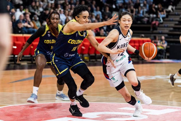 LYON-VILLEURBANNE, FRANCE - MARCH 14: Haeran Lee (Republic of Korea, 12) controls the ball against Mabel Martinez (Colombia, 10) during the FIBA Women™s World Cup Qualifying Tournament match between Republic of Korea (KOR) vs. Colombia (COL) at Astroballe on matchday 3 of the FIBA Women™s World Cup Qualifying Tournament on March 14, 2026 in Lyon-Villeurbanne, France. France Copyright: xSteffiexWunderlx