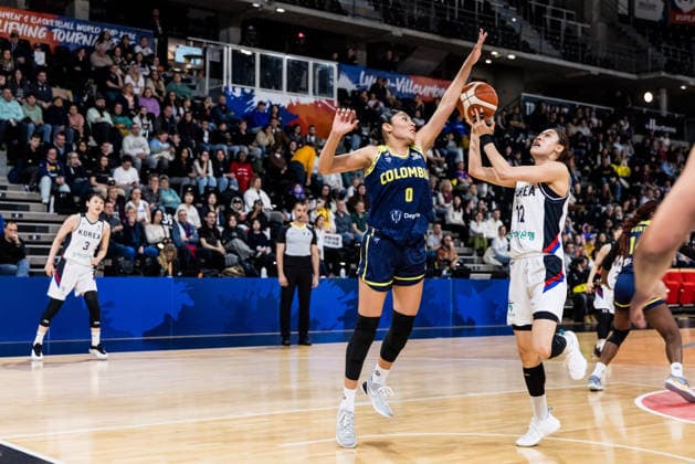 LYON-VILLEURBANNE, FRANCE - MARCH 14: Haeran Lee (Republic of Korea, 12) shoots the ball over Marta Moscarella (Colombia, 0) during the FIBA Women™s World Cup Qualifying Tournament match between Republic of Korea (KOR) vs. Colombia (COL) at Astroballe on matchday 3 of the FIBA Women™s World Cup Qualifying Tournament on March 14, 2026 in Lyon-Villeurbanne, France. France Copyright: xSteffiexWunderlx