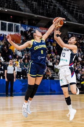 LYON-VILLEURBANNE, FRANCE - MARCH 14: Haeran Lee (Republic of Korea, 12) shoots the ball over Marta Moscarella (Colombia, 0) during the FIBA Women™s World Cup Qualifying Tournament match between Republic of Korea (KOR) vs. Colombia (COL) at Astroballe on matchday 3 of the FIBA Women™s World Cup Qualifying Tournament on March 14, 2026 in Lyon-Villeurbanne, France. France Copyright: xSteffiexWunderlx