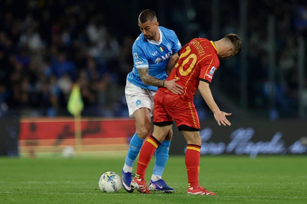 Italy: Serie a football match SSC Napoli vs Lecce Napoli s Italian defender Leonardo Spinazzola challenges for the ball with Lecce™s Albanian midfielder Ylber Ramadani during the Serie A football match between SSC Napoli vs Lecce at the Diego Armando Maradona Stadium in Naples on March 14, 2026. _BPH8408 Copyright: xAntonioxBalascox