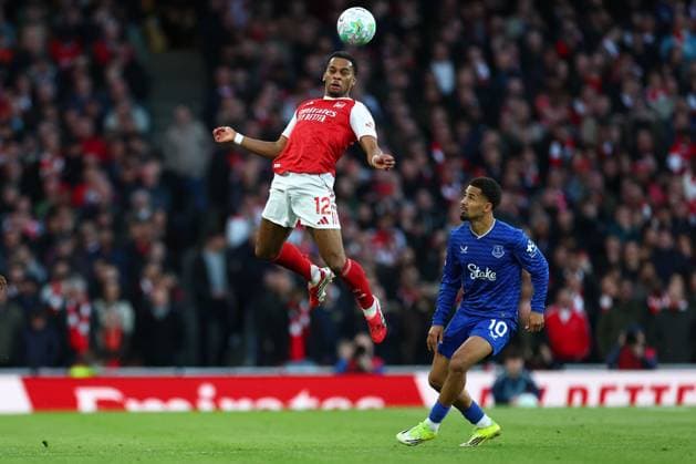 Jurrien Timber of Arsenal heads clear under pressure from Iliman Ndiaye of Everton Arsenal v Everton, Premier League, Football, Emirates Stadium, London, UK - 14 Mar 2026London Emirates Stadium United Kingdom EDITORIAL USE ONLY No use with unauthorised audio, video, data, fixture lists, club league logos or live services. Online in-match use limited to 120 images, no video emulation. No use in betting, games or single club league player publications. Copyright: xSimonxDael Shutterstockx 16757237y