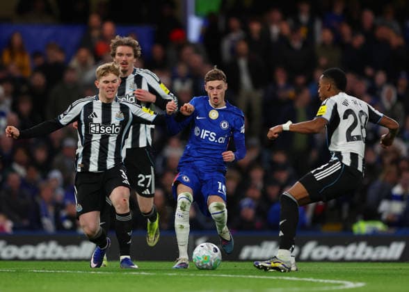 14th March 2026; Stamford Bridge, Chelsea, London, England: Premier League Football, Chelsea versus Newcastle United; Cole Palmer of Chelsea under pressure from Lewis Hall and Joe Willock of Newcastle United  JPxFletcher Content restricted for UK based newspaper