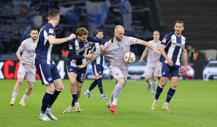 Marton Dardai, Philipp Hofmann duel match scene Action Sport Football Soccer DFL 2 Bundesliga Men 26 Matchday Season 2025 2026 14 03 2026 Hertha BSC Berlin vs VfL Bochum DFL regulations prohibit any use of photographs as image sequences and or quasi video