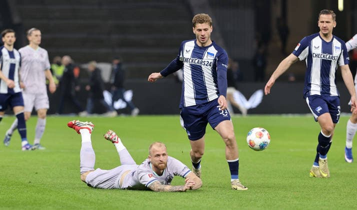 Marton Dardai, Philipp Hofmann duel match scene Action Sport Football Soccer DFL 2 Bundesliga Men 26 Matchday Season 2025 2026 14 03 2026 Hertha BSC Berlin vs VfL Bochum DFL regulations prohibit any use of photographs as image sequences and or quasi video