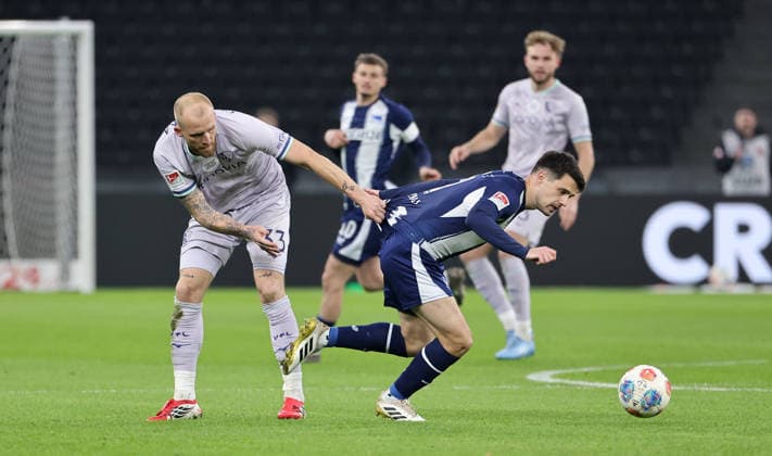 Philipp Hofmann, Josip Brekalo on the ball duel Match scene Action Sport Football Soccer DFL 2 Bundesliga Men 26 Matchday Season 2025 2026 14 03 2026 Hertha BSC Berlin vs VfL Bochum DFL regulations prohibit any use of photographs as image sequences and or quasi video