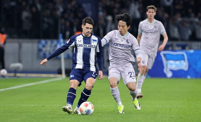 Josip Brekalo on the ball, Koji Miyoshi duel Match scene Action Sport Soccer Football DFL 2 Bundesliga Men 26 Matchday Season 2025 2026 14 03 2026 Hertha BSC Berlin vs VfL Bochum DFL regulations prohibit any use of photographs as image sequences and or quasi video