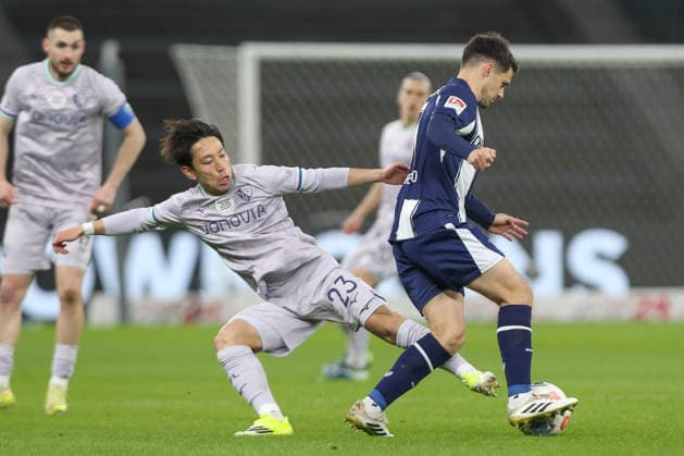 14 03 2026, xtgx, Soccer 2 Bundesliga Hertha BSC Berlin VfL Bochum emspor, v l Koji Miyoshi Bochum, 23 , Josip Brekalo Hertha, 7 duel, duel, fight, tackle DFL DFB REGULATIONS PROHIBIT ANY USE OF PHOTOGRAPHS as IMAGE SEQUENCES and or QUASI VIDEO Berlin