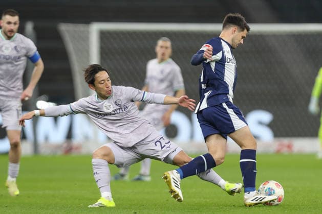 14 03 2026, xtgx, Soccer 2 Bundesliga Hertha BSC Berlin VfL Bochum emspor, v l Koji Miyoshi Bochum, 23 , Josip Brekalo Hertha, 7 duel, duel, fight, tackle DFL DFB REGULATIONS PROHIBIT ANY USE OF PHOTOGRAPHS as IMAGE SEQUENCES and or QUASI VIDEO Berlin