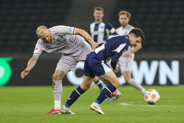 14 03 2026, xtgx, Soccer 2 Bundesliga Hertha BSC Berlin VfL Bochum emspor, v l Philipp Hofmann Bochum, 33 , Josip Brekalo Hertha, 7 duel, duel, fight, tackle DFL DFB REGULATIONS PROHIBIT ANY USE OF PHOTOGRAPHS as IMAGE SEQUENCES and or QUASI VIDEO Berlin