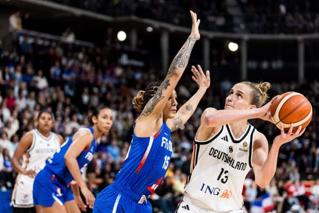 LYON-VILLEURBANNE, FRANCE - MARCH 14: Leonie Fiebich (Germany, 13) controls the ball against Gabby Williams (France, 15) during the FIBA Women™s World Cup Qualifying Tournament match between Germany (GER) vs. France (FRA) at Astroballe on matchday 3 of the FIBA Women™s World Cup Qualifying Tournament on March 14, 2026 in Lyon-Villeurbanne, France. France Copyright: xSteffiexWunderlx