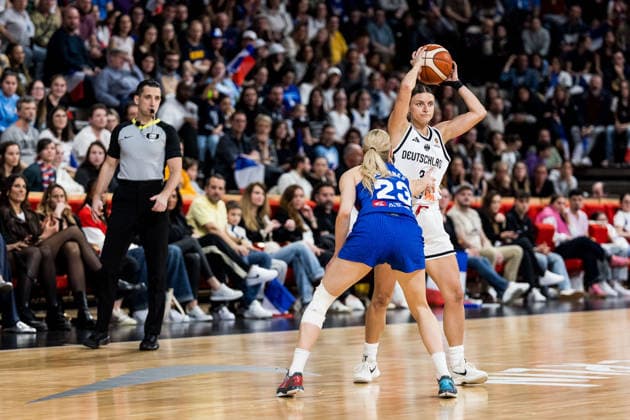LYON-VILLEURBANNE, FRANCE - MARCH 14: Alexandra Wilke (Germany, 3) controls the ball against Marine Johannes (France, 23) during the FIBA Women™s World Cup Qualifying Tournament match between Germany (GER) vs. France (FRA) at Astroballe on matchday 3 of the FIBA Women™s World Cup Qualifying Tournament on March 14, 2026 in Lyon-Villeurbanne, France. France Copyright: xSteffiexWunderlx
