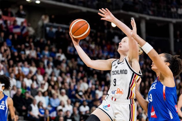 LYON-VILLEURBANNE, FRANCE - MARCH 14: Emma Eichmeyer (Germany, 9) controls the ball against Janelle Salaun (France, 13) during the FIBA Women™s World Cup Qualifying Tournament match between Germany (GER) vs. France (FRA) at Astroballe on matchday 3 of the FIBA Women™s World Cup Qualifying Tournament on March 14, 2026 in Lyon-Villeurbanne, France. France Copyright: xSteffiexWunderlx
