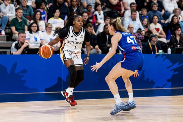 LYON-VILLEURBANNE, FRANCE - MARCH 14: Alexis Peterson (Germany, 1) controls the ball against Romane Bernies (France, 47) during the FIBA Women™s World Cup Qualifying Tournament match between Germany (GER) vs. France (FRA) at Astroballe on matchday 3 of the FIBA Women™s World Cup Qualifying Tournament on March 14, 2026 in Lyon-Villeurbanne, France. France Copyright: xSteffiexWunderlx