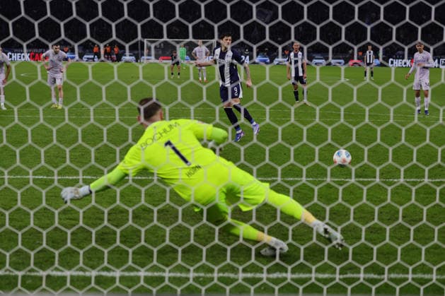 BERLIN, DEUTSCHLAND - MARCH 14: 11m, penalty for Hertha BSC, Dawid Kownacki (Hertha, 9) goal, scores into the goal, Torwart Goal Keeper Timo Horn (VfL Bochum, 1) cannot intervene, cannot reach the ball, during the match in the 2. German Bundesliga: Hertha BSC - VfL Bochum at Olympiastadion on matchday 26 on March 14, 2026 in Berlin, Deutschland. DFB regulations prohibit any use of photographs as image sequences and or quasi video. Berlin Deutschland Copyright: xO.Franke,xSportblen.dex