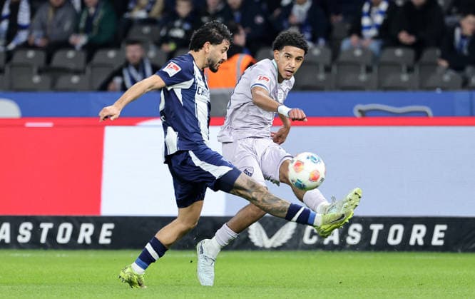Kevin Sessa, Francis Onyeka on the ball duel Match scene Action Sport Football Soccer DFL 2 Bundesliga Men 26 Matchday Season 2025 2026 14 03 2026 Hertha BSC Berlin vs VfL Bochum DFL regulations prohibit any use of photographs as image sequences and or quasi video