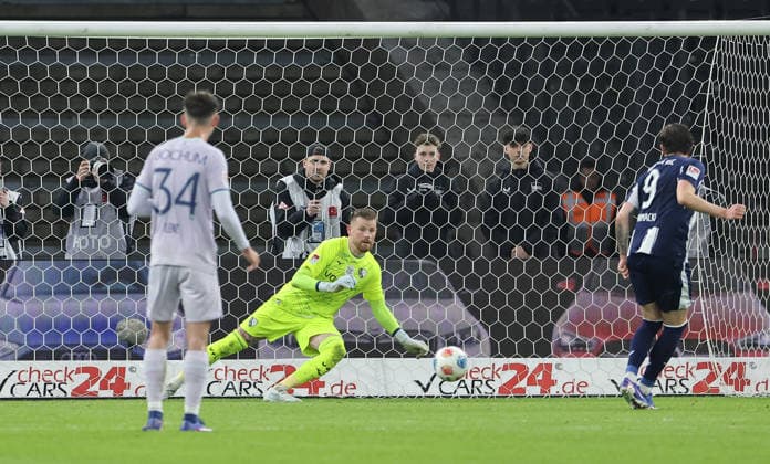 Dawid Kownacki scores from the penalty spot to make it 1-0 against goalkeeper Timo Horn Sport Football Soccer DFL 2 Bundesliga Men 26 Matchday Season 2025 2026 14 03 2026 Hertha BSC Berlin vs VfL Bochum DFL regulations prohibit any use of photographs as image sequences and or quasi video