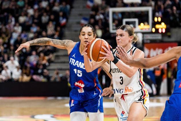 LYON-VILLEURBANNE, FRANCE - MARCH 14: Alexandra Wilke (Germany, 3) controls the ball against Gabby Williams (France, 15) during the FIBA Women™s World Cup Qualifying Tournament match between Germany (GER) vs. France (FRA) at Astroballe on matchday 3 of the FIBA Women™s World Cup Qualifying Tournament on March 14, 2026 in Lyon-Villeurbanne, France. France Copyright: xSteffiexWunderlx