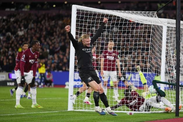 Erling Haaland of Manchester City celebrates as teammate Bernardo Silva (not pictured) scores his teams first goal of the match West Ham v Manchester City, Football, Premier League, London Stadium, London, UK - 14 03 2026 EDITORIAL USE ONLY No use with unauthorised audio, video, data, fixture lists (outside the EU), club league logos or live services. Online in-match use limited to 45 images (+15 in extra time). No use to emulate moving images. No use in betting, games or Copyright: xAnthonyxHanc Shutterstockx 16773173i