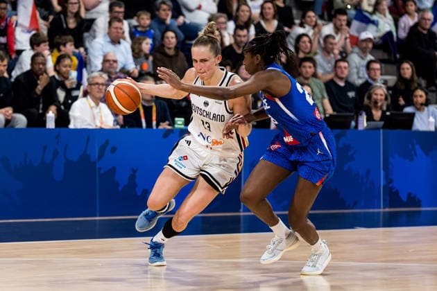 LYON-VILLEURBANNE, FRANCE - MARCH 14: Leonie Fiebich (Germany, 13) controls the ball against Migna Toure (France, 28) during the FIBA Women™s World Cup Qualifying Tournament match between Germany (GER) vs. France (FRA) at Astroballe on matchday 3 of the FIBA Women™s World Cup Qualifying Tournament on March 14, 2026 in Lyon-Villeurbanne, France. France Copyright: xSteffiexWunderlx