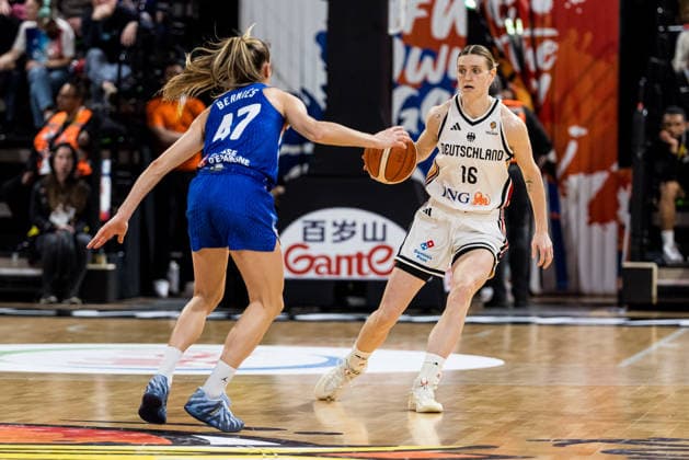 LYON-VILLEURBANNE, FRANCE - MARCH 14: Alina Hartmann (Germany, 16) controls the ball against Romane Bernies (France, 47) during the FIBA Women™s World Cup Qualifying Tournament match between Germany (GER) vs. France (FRA) at Astroballe on matchday 3 of the FIBA Women™s World Cup Qualifying Tournament on March 14, 2026 in Lyon-Villeurbanne, France. France Copyright: xSteffiexWunderlx