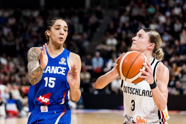 LYON-VILLEURBANNE, FRANCE - MARCH 14: Alexandra Wilke (Germany, 3) controls the ball against Gabby Williams (France, 15) during the FIBA Women™s World Cup Qualifying Tournament match between Germany (GER) vs. France (FRA) at Astroballe on matchday 3 of the FIBA Women™s World Cup Qualifying Tournament on March 14, 2026 in Lyon-Villeurbanne, France. France Copyright: xSteffiexWunderlx