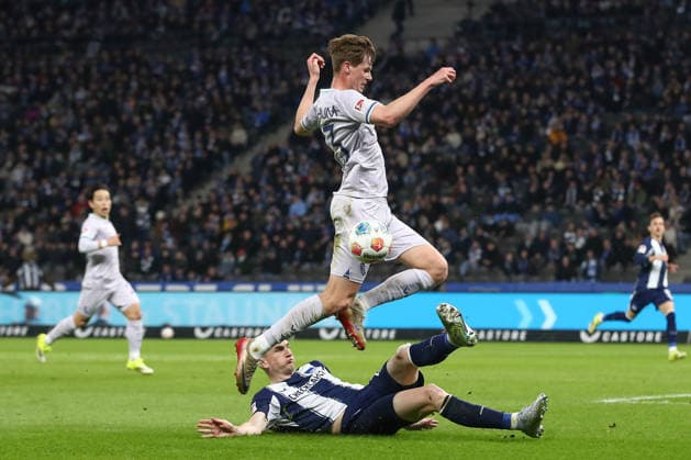 14 03 2026, xtgx, Soccer 2 Bundesliga Hertha BSC Berlin VfL Bochum emspor, Oliver Olsen Bochum, 13 , Niklas Kolbe Hertha, 27 duel, fight, tackle DFL DFB REGULATIONS PROHIBIT ANY USE OF PHOTOGRAPHS as IMAGE SEQUENCES and or QUASI VIDEO Berlin