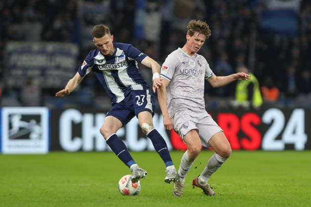 14 03 2026, xtgx, Soccer 2 Bundesliga Hertha BSC Berlin VfL Bochum emspor, Oliver Olsen Bochum, 13 , Niklas Kolbe Hertha, 27 duel, fight, tackle DFL DFB REGULATIONS PROHIBIT ANY USE OF PHOTOGRAPHS as IMAGE SEQUENCES and or QUASI VIDEO Berlin