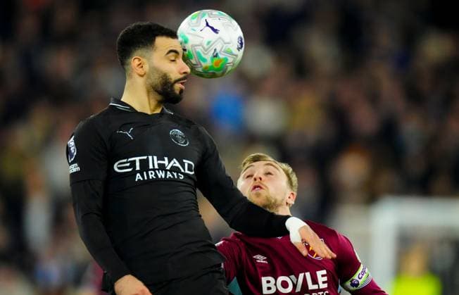 Rayan Aït-Nouri of Manchester City heads under pressure from Jarrod Bowen of West Ham United West Ham United v Manchester City, Premier League, Football, London Stadium, London, UK - 14 Mar 2026London London Stadium United Kingdom EDITORIAL USE ONLY No use with unauthorised audio, video, data, fixture lists, club league logos or live services. Online in-match use limited to 120 images, no video emulation. No use in betting, games or single club league player publications. Copyright: xJavierxGarcia Shutterstockx 16757243y