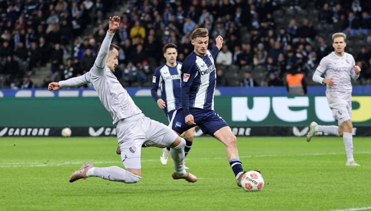 Erhan Masovic, Michael Cuisance on the ball duel Match scene Action Sport Football Soccer DFL 2 Bundesliga Men 26 Matchday Season 2025 2026 14 03 2026 Hertha BSC Berlin vs VfL Bochum DFL regulations prohibit any use of photographs as image sequences and or quasi video