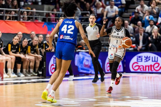 LYON-VILLEURBANNE, FRANCE - MARCH 14: Alexis Peterson (Germany, 1) controls the ball against Leila Lacan (France, 42) during the FIBA Women™s World Cup Qualifying Tournament match between Germany (GER) vs. France (FRA) at Astroballe on matchday 3 of the FIBA Women™s World Cup Qualifying Tournament on March 14, 2026 in Lyon-Villeurbanne, France. France Copyright: xSteffiexWunderlx