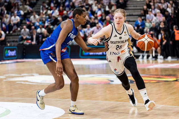 LYON-VILLEURBANNE, FRANCE - MARCH 14: Frieda Buehner (Bühner, Buhner Germany, 20) controls the ball against Valeriane Ayayi (France, 11) during the FIBA Women™s World Cup Qualifying Tournament match between Germany (GER) vs. France (FRA) at Astroballe on matchday 3 of the FIBA Women™s World Cup Qualifying Tournament on March 14, 2026 in Lyon-Villeurbanne, France. France Copyright: xSteffiexWunderlx