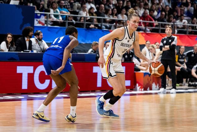 LYON-VILLEURBANNE, FRANCE - MARCH 14: Leonie Fiebich (Germany, 13) controls the ball against Valeriane Ayayi (France, 11) during the FIBA Women™s World Cup Qualifying Tournament match between Germany (GER) vs. France (FRA) at Astroballe on matchday 3 of the FIBA Women™s World Cup Qualifying Tournament on March 14, 2026 in Lyon-Villeurbanne, France. France Copyright: xSteffiexWunderlx