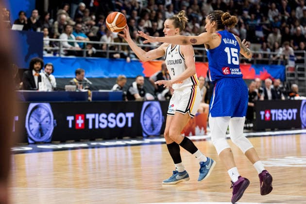 LYON-VILLEURBANNE, FRANCE - MARCH 14: Leonie Fiebich (Germany, 13) controls the ball against Gabby Williams (France, 15) during the FIBA Women™s World Cup Qualifying Tournament match between Germany (GER) vs. France (FRA) at Astroballe on matchday 3 of the FIBA Women™s World Cup Qualifying Tournament on March 14, 2026 in Lyon-Villeurbanne, France. France Copyright: xSteffiexWunderlx