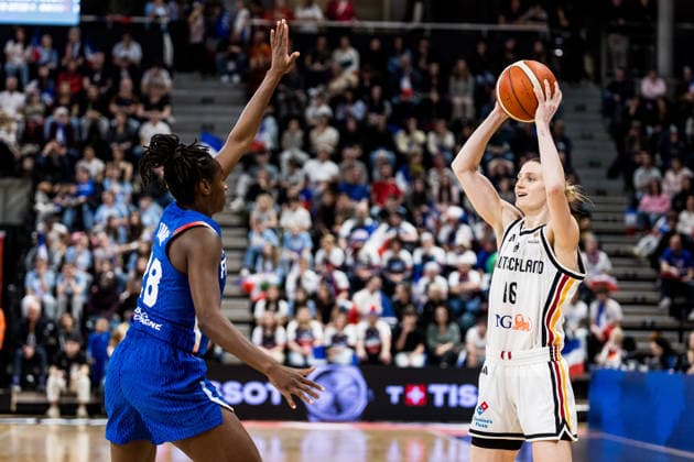 LYON-VILLEURBANNE, FRANCE - MARCH 14: Alina Hartmann (Germany, 16) controls the ball against Migna Toure (France, 28) during the FIBA Women™s World Cup Qualifying Tournament match between Germany (GER) vs. France (FRA) at Astroballe on matchday 3 of the FIBA Women™s World Cup Qualifying Tournament on March 14, 2026 in Lyon-Villeurbanne, France. France Copyright: xSteffiexWunderlx
