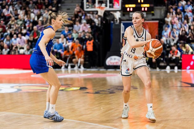 LYON-VILLEURBANNE, FRANCE - MARCH 14: Britta Daub (Germany, 19) controls the ball against Romane Bernies (France, 47) during the FIBA Women™s World Cup Qualifying Tournament match between Germany (GER) vs. France (FRA) at Astroballe on matchday 3 of the FIBA Women™s World Cup Qualifying Tournament on March 14, 2026 in Lyon-Villeurbanne, France. France Copyright: xSteffiexWunderlx