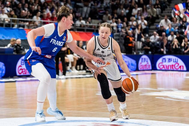 LYON-VILLEURBANNE, FRANCE - MARCH 14: Emma Eichmeyer (Germany, 9) controls the ball against Alexia Chery (France, 6) during the FIBA Women™s World Cup Qualifying Tournament match between Germany (GER) vs. France (FRA) at Astroballe on matchday 3 of the FIBA Women™s World Cup Qualifying Tournament on March 14, 2026 in Lyon-Villeurbanne, France. France Copyright: xSteffiexWunderlx