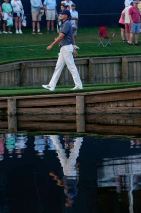 March 14, 2026, Ponte Vedra, Florida, USA: March 14, 2026, Ponte Vedra, Florida.Ludvig Aberg (Sweden) walks off the 17th green during the third round of The PLAYERS Championship at TPC Sawgrass. PGA, Golf Herren Tour 2026: The PLAYERS Championship  - ZUMAd212 20260314_zsp_d212_017 Copyright: xRichardxDolex