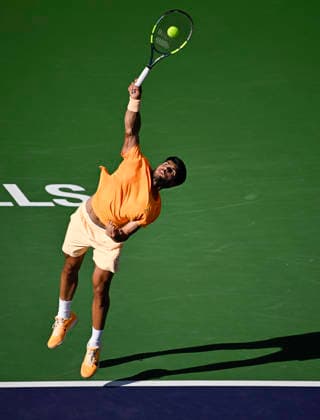March 14, 2026 Carlos Alcaraz (ESP) serves against Daniil Medvedev during their semifinal match at the BNP Paribas Open held at the Indian Wells Tennis Garden in Indian Wells, California. Mandatory Photo Credit : CSM Indian Wells United States of America - ZUMAc04_ 20260314_zma_c04_062 Copyright: xCharlesxBausx