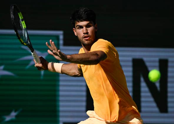 March 14, 2026 Carlos Alcaraz (ESP) returns a shot against Daniil Medvedev during their semifinal match at the BNP Paribas Open held at the Indian Wells Tennis Garden in Indian Wells, California. Mandatory Photo Credit : CSM Indian Wells United States of America - ZUMAc04_ 20260314_zma_c04_069 Copyright: xCharlesxBausx