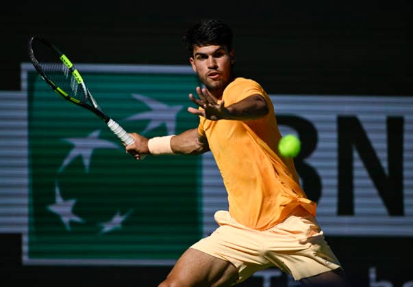 March 14, 2026 Carlos Alcaraz (ESP) returns a shot against Daniil Medvedev during their semifinal match at the BNP Paribas Open held at the Indian Wells Tennis Garden in Indian Wells, California. Mandatory Photo Credit : CSM Indian Wells United States of America - ZUMAc04_ 20260314_zma_c04_071 Copyright: xCharlesxBausx