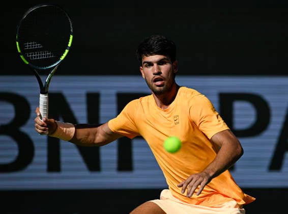 March 14, 2026 Carlos Alcaraz (ESP) returns a shot against Daniil Medvedev during their semifinal match at the BNP Paribas Open held at the Indian Wells Tennis Garden in Indian Wells, California. Mandatory Photo Credit : CSM Indian Wells United States of America - ZUMAc04_ 20260314_zma_c04_073 Copyright: xCharlesxBausx
