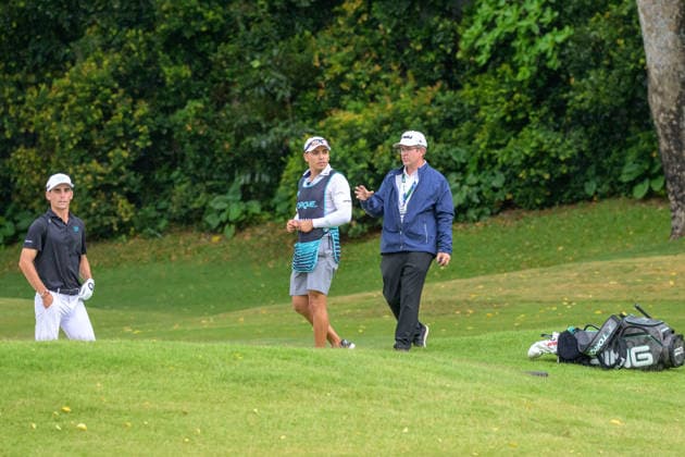 March 15, 2026, Singapore, Ingapore, Singapore: Leader, Joaquin Niemann from Chile, is told by the course rule man to stop play immediately on the fairway of the 10th as rain starts to fall.Final Round of the LIV Golf in Singapore Final Round Of The LIV Golf In Singapore  - ZUMAr144 20260315_zap_r144_009 Copyright: xJaynexRussellx