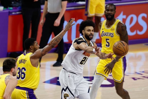 LOS ANGELES, CA - MARCH 14: Denver Nuggets guard Jamal Murray (27) passes the ball during the Denver Nuggets vs Los Angeles Lakers game on March 14, 2026, at Crypto.com Arena in Los Angeles, CA. (Photo by Jevone Moore Icon Sportswire) NBA, Basketball Herren, USA MAR 14 Denver Nuggets at Los Angeles Lakers EDITORIAL USE ONLY Icon20260314010