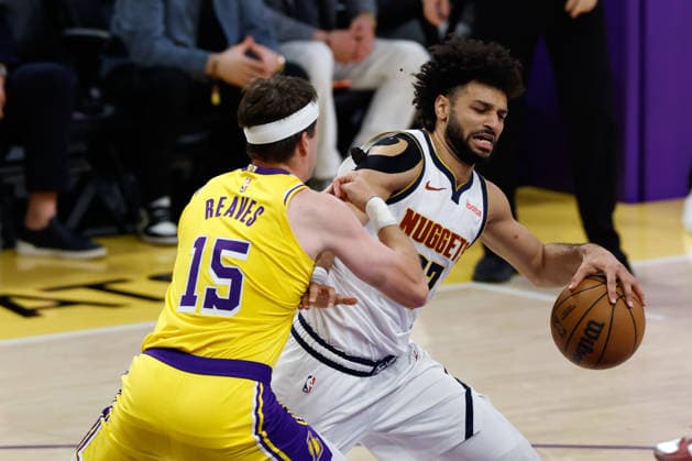 LOS ANGELES, CA - MARCH 14: Denver Nuggets guard Jamal Murray (27) works against Los Angeles Lakers guard Austin Reaves (15) during the Denver Nuggets vs Los Angeles Lakers game on March 14, 2026, at Crypto.com Arena in Los Angeles, CA. (Photo by Jevone Moore Icon Sportswire) NBA, Basketball Herren, USA MAR 14 Denver Nuggets at Los Angeles Lakers EDITORIAL USE ONLY Icon20260314023