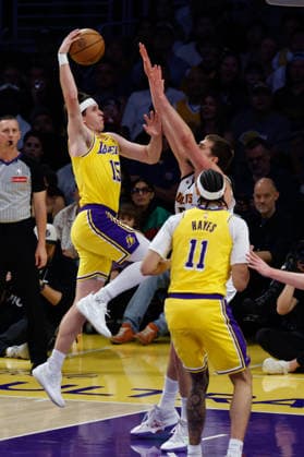 LOS ANGELES, CA - MARCH 14: Los Angeles Lakers guard Austin Reaves (15) takes off on Denver Nuggets center Nikola Jokic (15) during the Denver Nuggets vs Los Angeles Lakers game on March 14, 2026, at Crypto.com Arena in Los Angeles, CA. (Photo by Jevone Moore Icon Sportswire) NBA, Basketball Herren, USA MAR 14 Denver Nuggets at Los Angeles Lakers EDITORIAL USE ONLY Icon20260314032