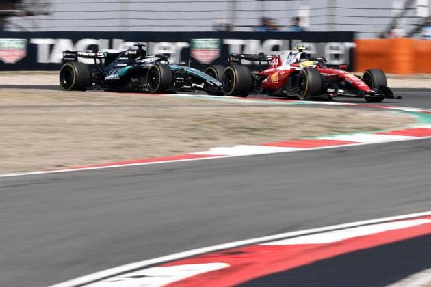 SHANGHAI, CHINA - MARCH 14: George Russell (L) of Mercedes-AMG Petronas Formula One Team and Lewis Hamilton of Scuderia Ferrari HP Formula One Team compete in the Sprint Race during the 2026 Formula 1 Chinese Grand Prix at the Shanghai International Circuit on March 14, 2026 in Shanghai, China. The 2026 Formula 1 Chinese Grand Prix takes place at the Shanghai International Circuit from March 13 to 15.  Copyright: xChinaxNewsxServicex 111628161553